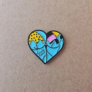 Sally’s Heart-Shaped Pin